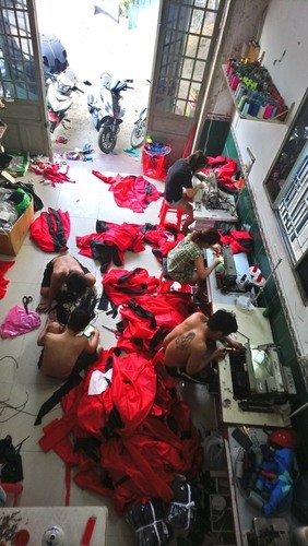 xưởng may áo khoác đồng phục giá rẻ quận Tân Bình